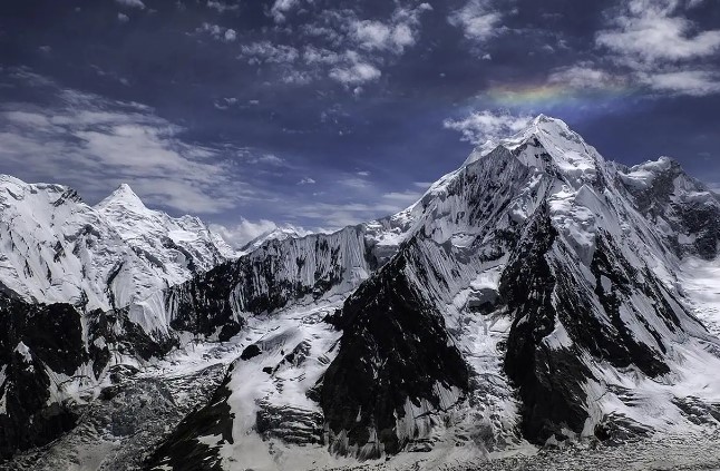 A spectacular shot of Baintha Brakk, also called The Ogre, a high-altitude rock and ice climbing challenge in the Karakoram Range, famous for its extreme mountaineering difficulty.