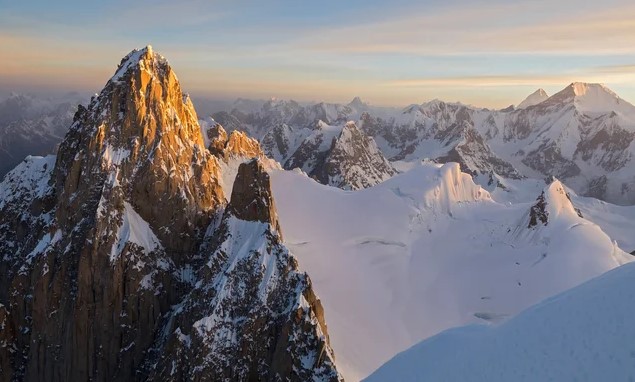 A breathtaking view of KG, K7 Peak, a majestic 7281-meter mountain in the Karakoram Range, known for its steep rock walls and challenging climbing routes.