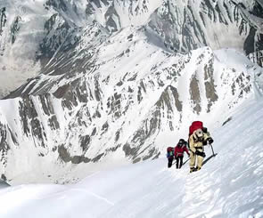 Mountaineers climbing the icy slopes of Nanga Parbat, also known as the  Killer Mountain, one of the toughest climbs in the world.